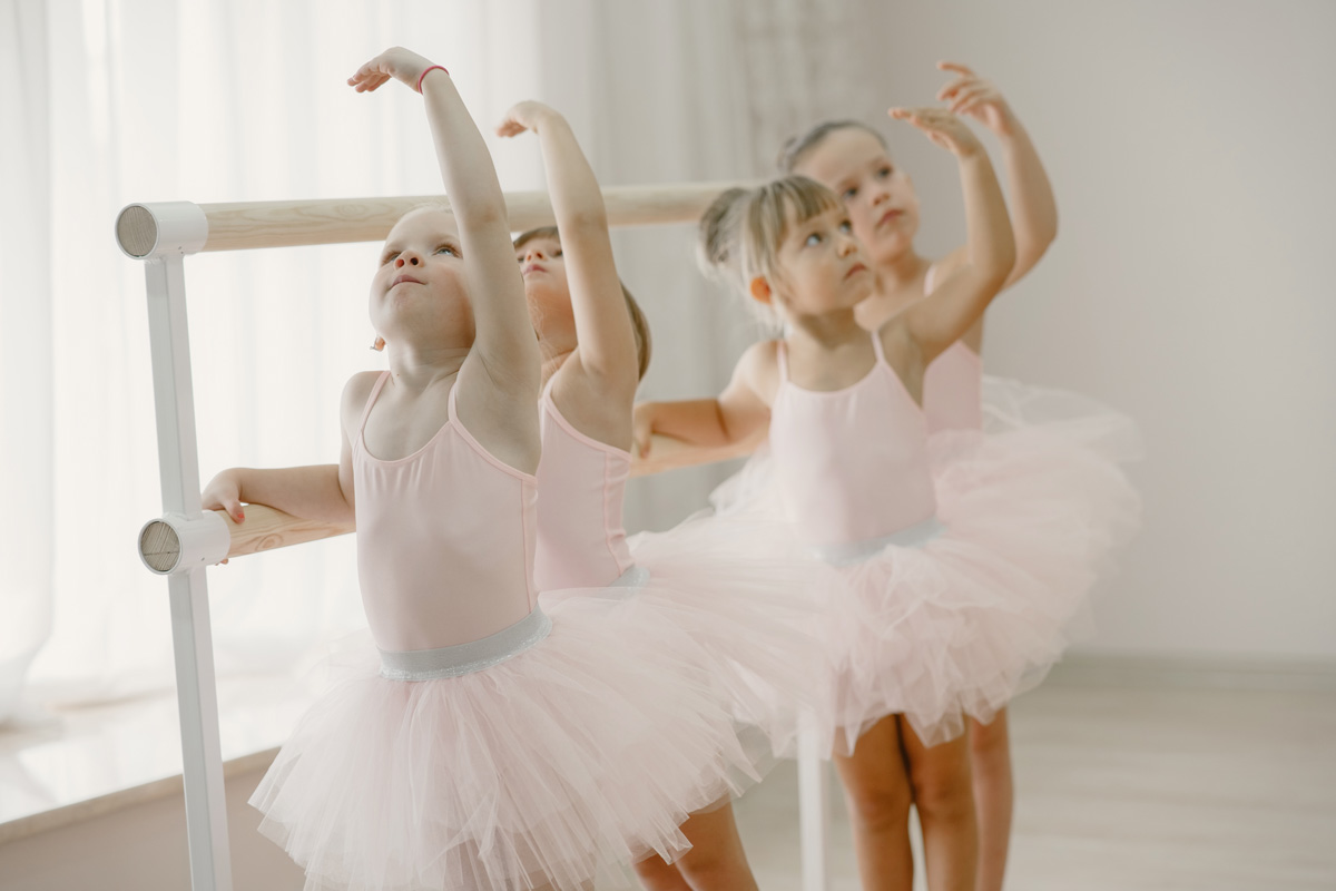 cute-little-ballerinas-pink-ballet-costume-children-pointe-shoes-is-dancing -room-kid-dance-class - Crestar Learning Centre